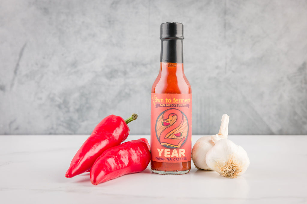 9 month barrel aged carolina reaper hot sauce made sriracha style! Carolina Creeper